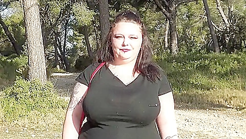 Beautiful girl in a nude bodysuit with a very round ass