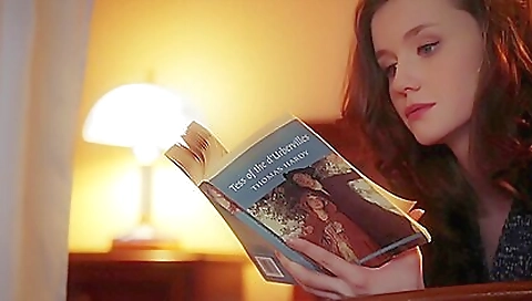 Emily blooms in her white dress and stockings in a solo vid