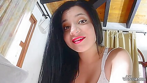 Brunette milf sucking off a big cock in the bedroom