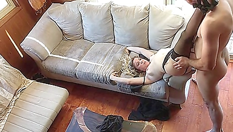 Sexy brunette is dressed in lingerie and she gets fucked