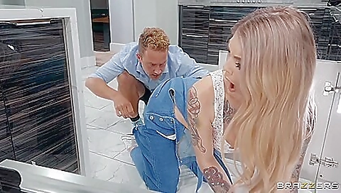 Tattooed blonde in a tattooed pussy sucking a cock